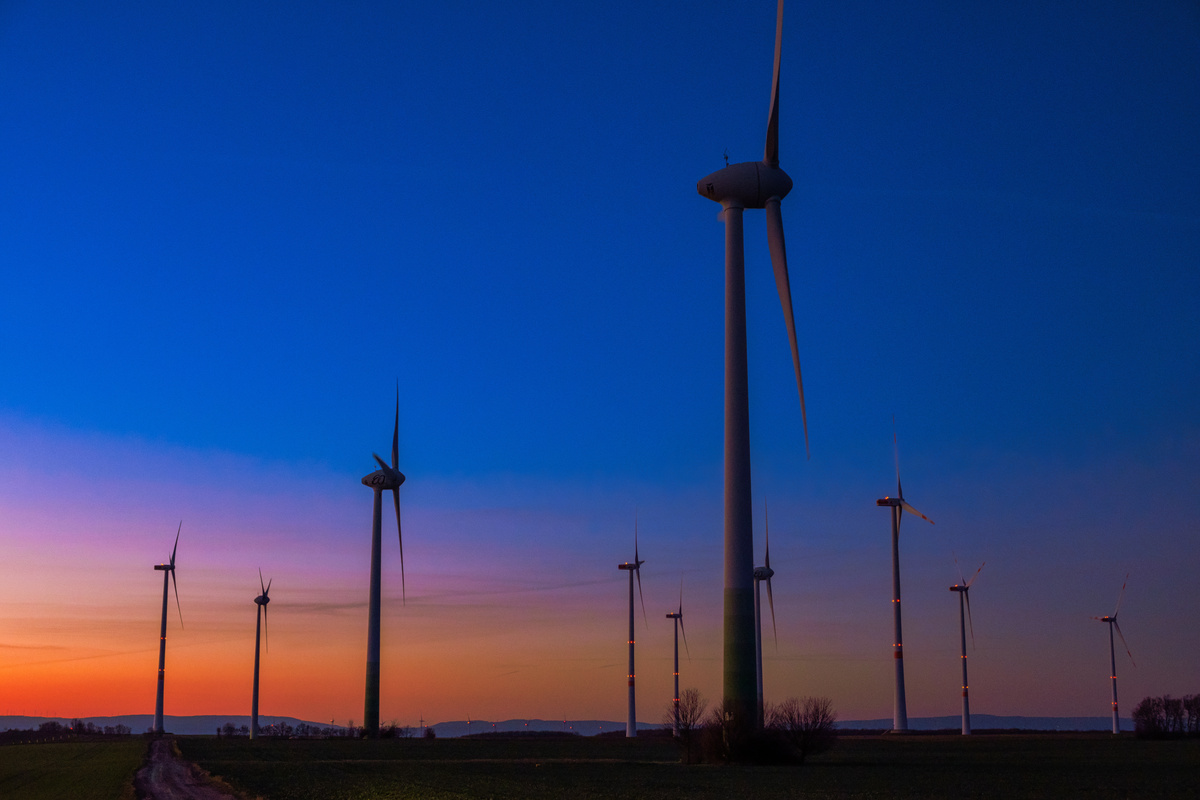 Wind Turbines Under Blue Sky